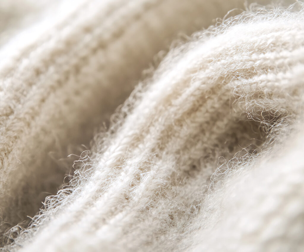 machine knitted ivory colored material
