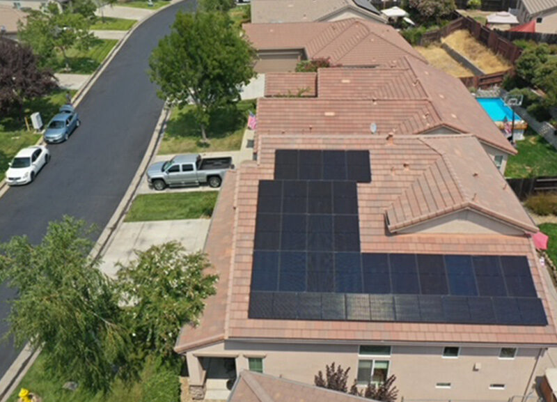 Solar panels on the roof of a home by Sun Energy